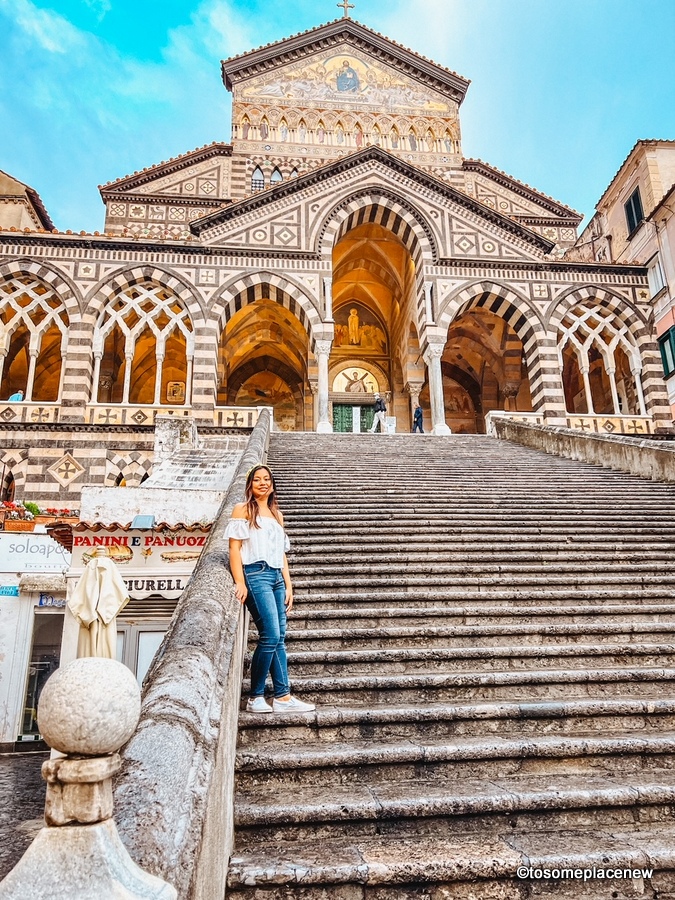 Girl standing in front of Amalfi Duomo